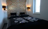 Unser kuscheliges Doppelbett lädt zum entspannen und erholen ein | © @wolfistraunseeblick