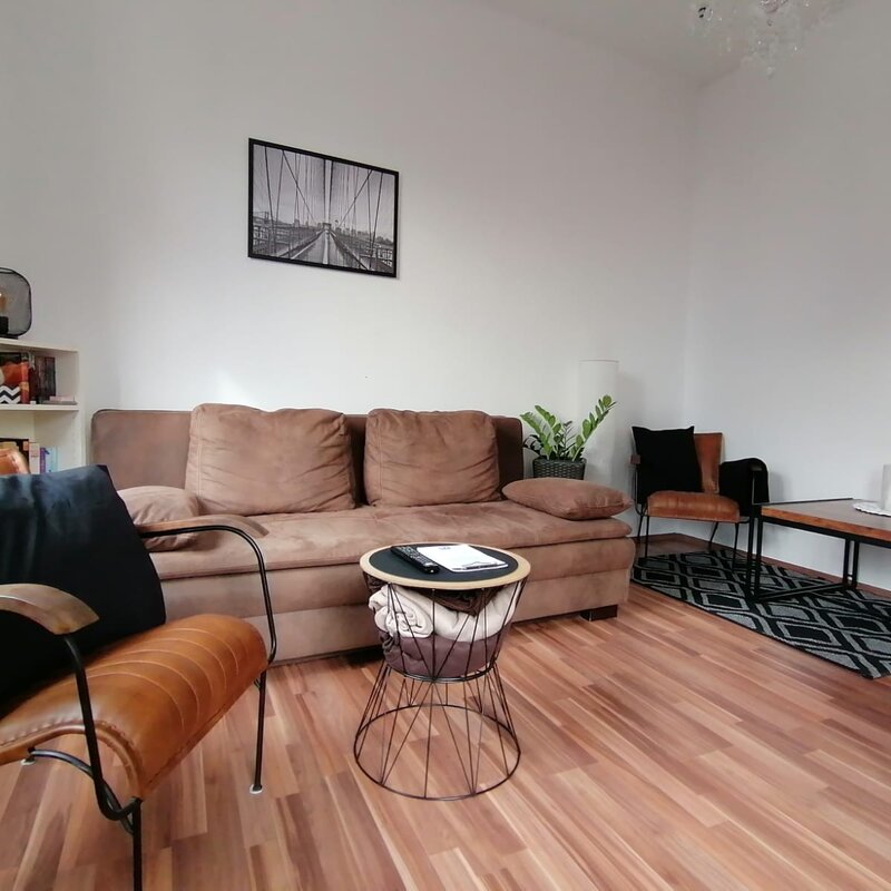 Gemütliches Wohnzimmer mit Ausziehsofa | © @ Wolfi's Traunseeblick