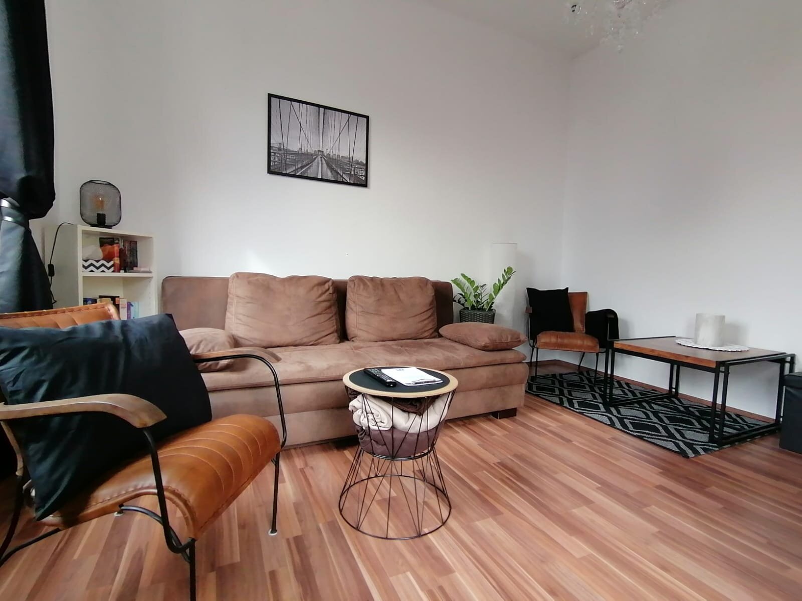 Gemütliches Wohnzimmer mit Ausziehsofa | © @ Wolfi's Traunseeblick