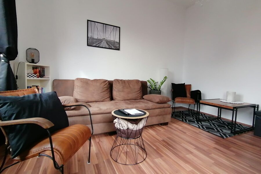 Gemütliches Wohnzimmer mit Ausziehsofa | © @ Wolfi's Traunseeblick