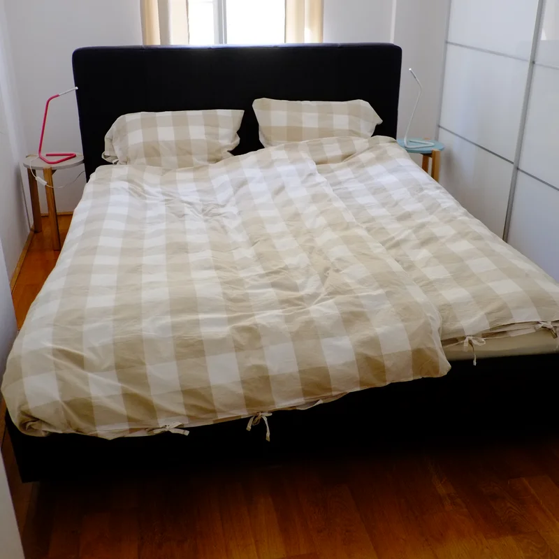 Sleeping room with wardrobe