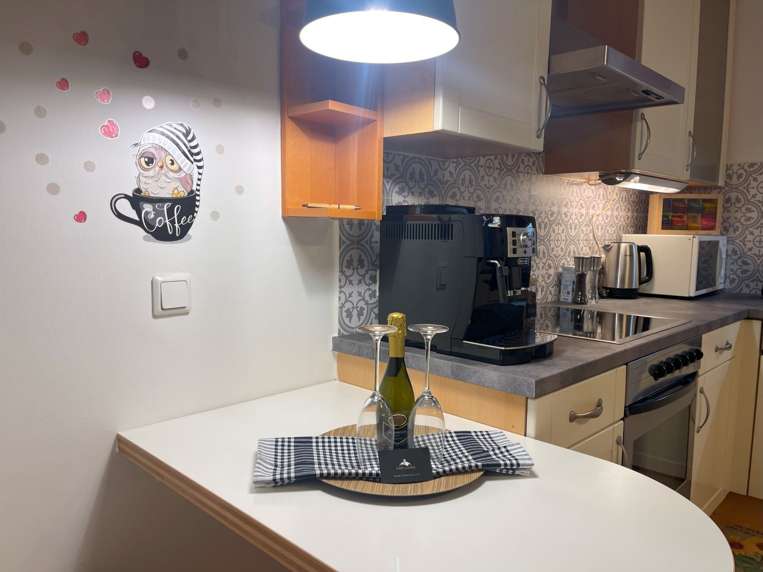 Fully equipped kitchen with fully automatic coffee machine