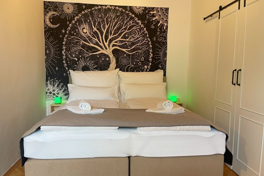 Comfortable king-size box-spring bed with Austrian quality bed linen