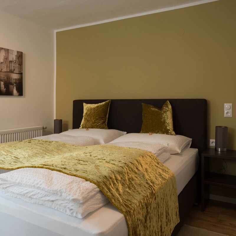 Das grüne Schlazfimmer südseitig hat einen direkten Zugang auf die Terasse