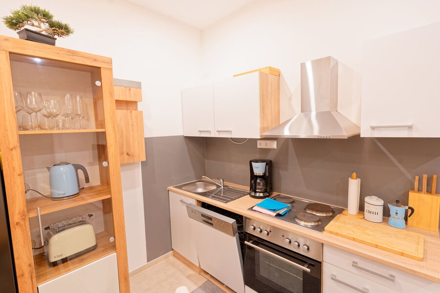 Küche mit Kaffeemaschine, Espresso Maschine, Geschirrspüler, Wasserkocher, Toaster, u.v.m. | © Sammer