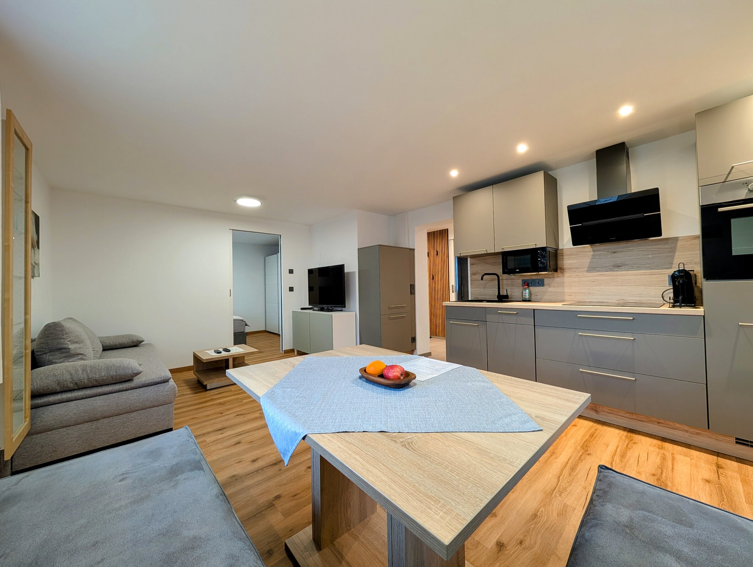 Bright open-plan kitchen & living area – 2-room apartment for short-term rental & temporary housing for 1 to 6 months in Salzburg