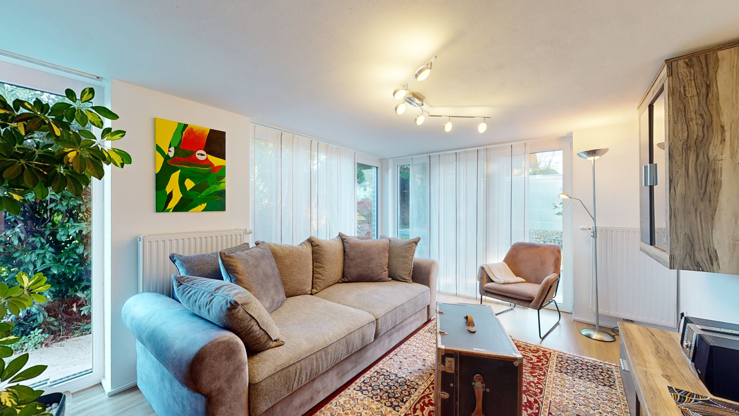Bright living room with garden view – 3-room apartment, short-term rental & temporary housing for 1 to 6 months in Sattledt