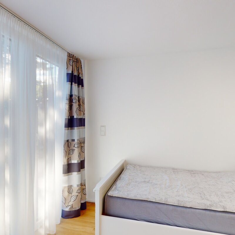 Schlafzimmer mit 2 Einzelbetten 