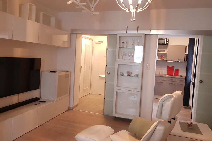 View to entrance and kitchen