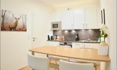 kitchen with dining table and highchairs | © Firmengruppe Abenthung