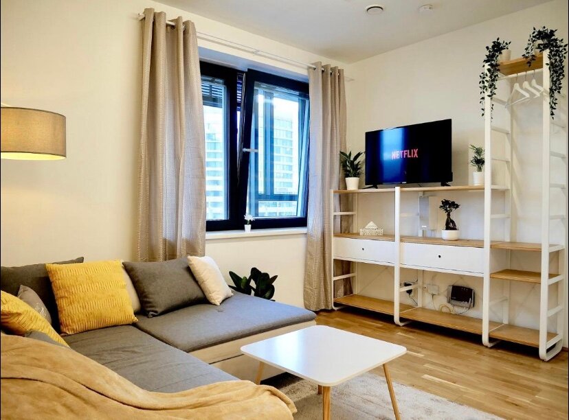Wohnzimmer mit TV und Bettsofa | © Firmengruppe Abenthung