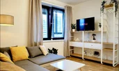 living room with TV an bed sofa | © Firmengruppe Abenthung