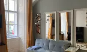 Bed couch with huge windows