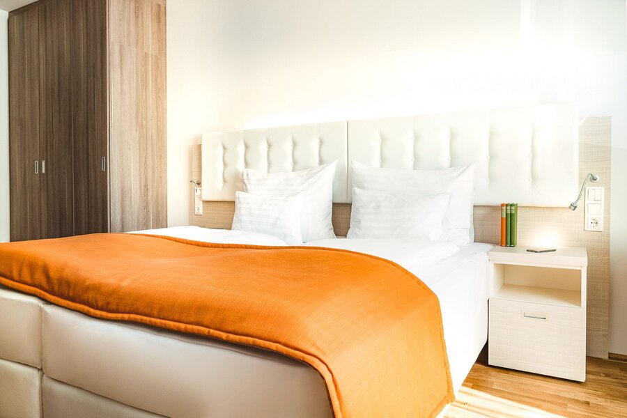 Bright bedroom with double bed & modern interior – 2-room apartment, short-term rental, temporary housing for 1 to 6 months, Vienna