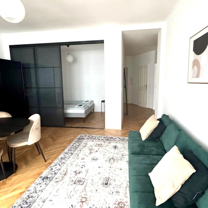 Living room with a double bed