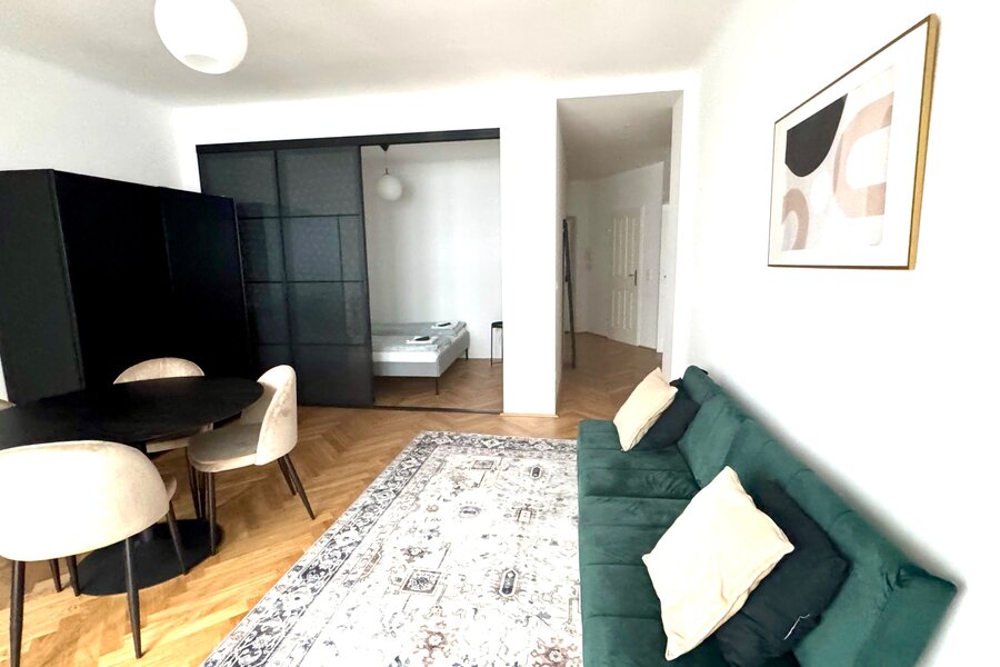 Living room with a double bed