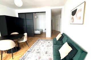 Living room with a double bed