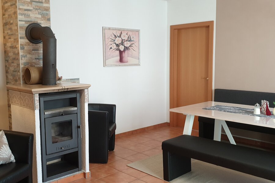 Dining, TV, fireplace, armchair