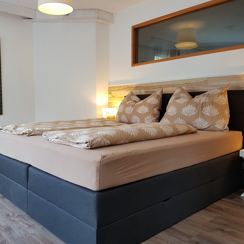 Box spring bed, wardrobe, TV