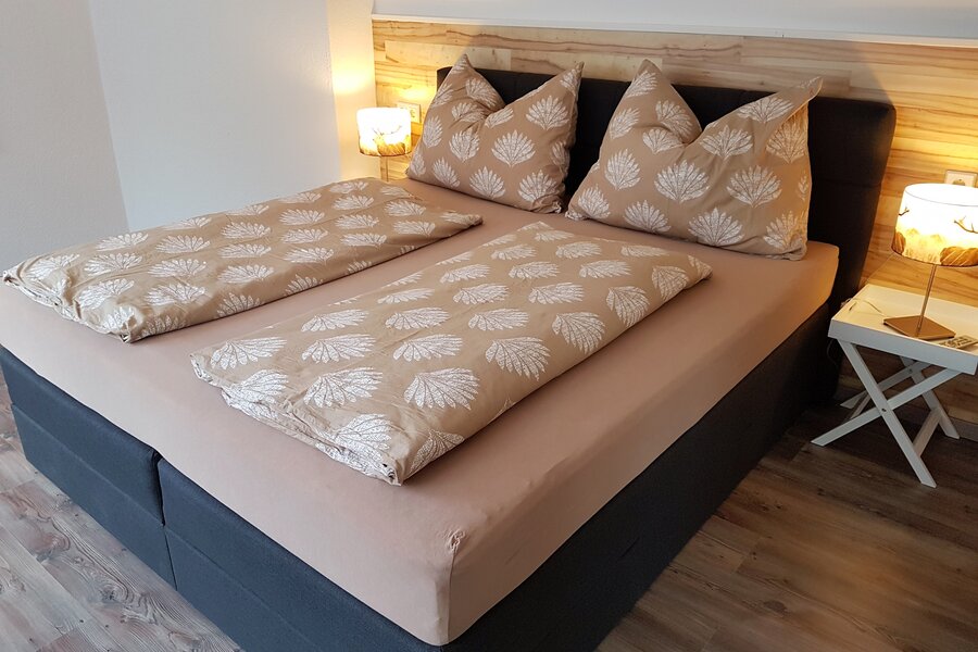 Box spring bed, wardrobe, TV