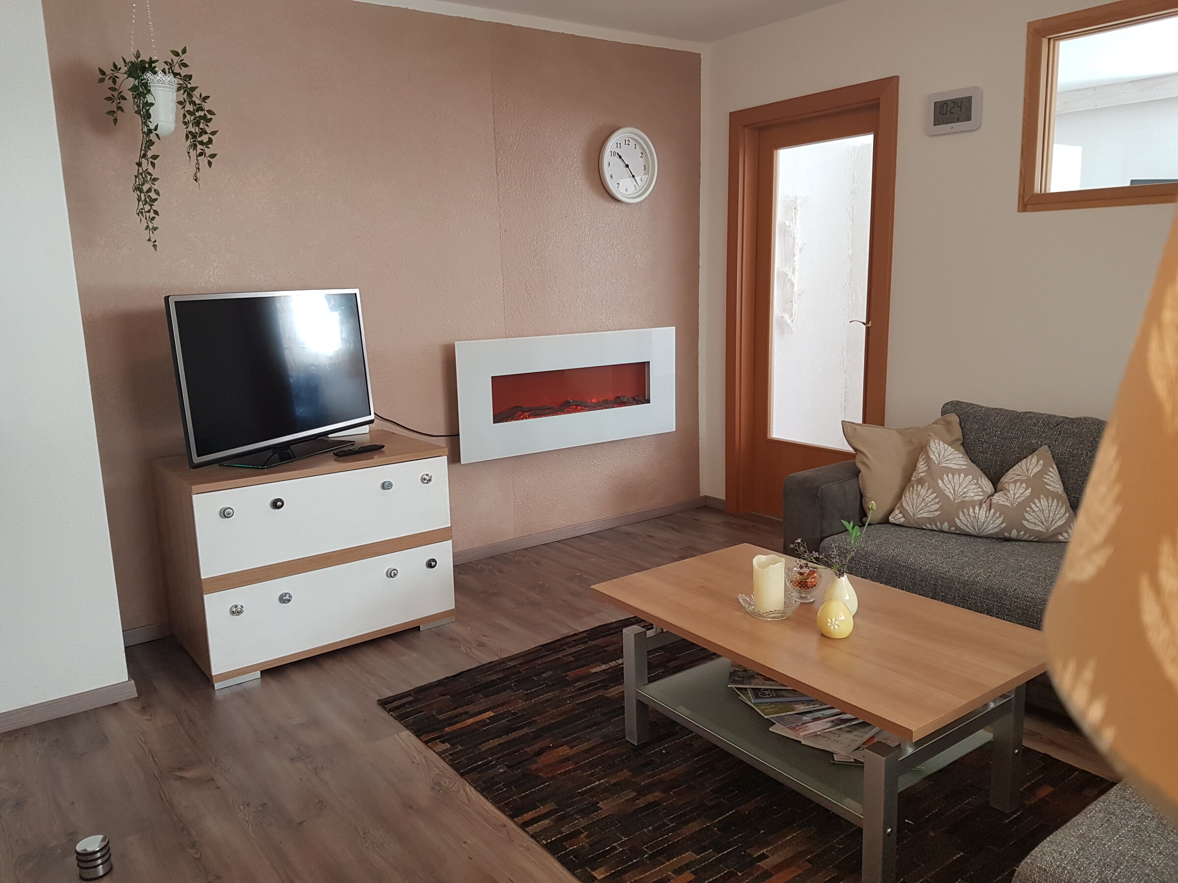 Couch, TV, fireplace, armchair