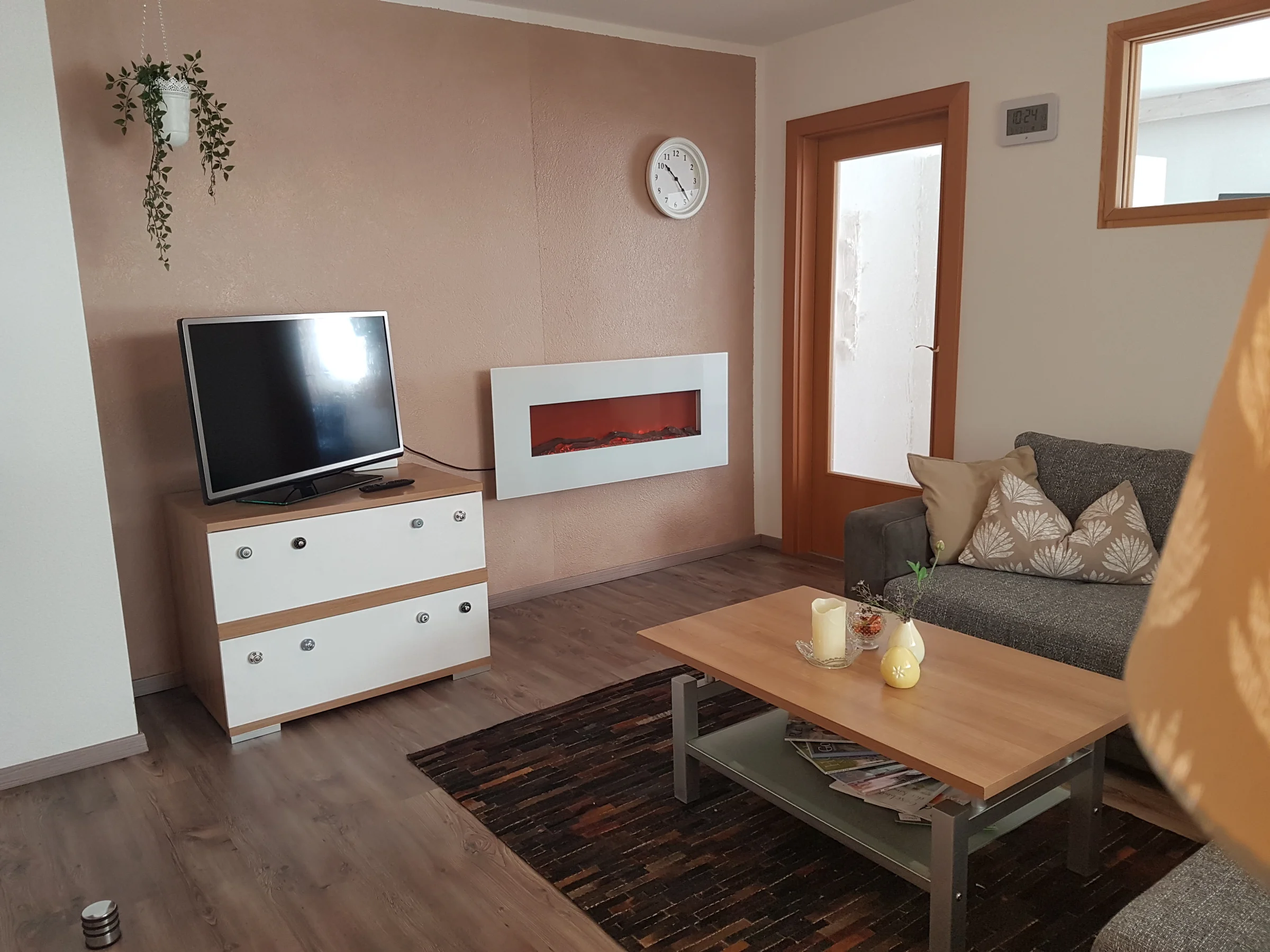 Couch, TV, fireplace, armchair