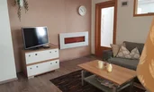Couch, TV, Kamin, Sessel