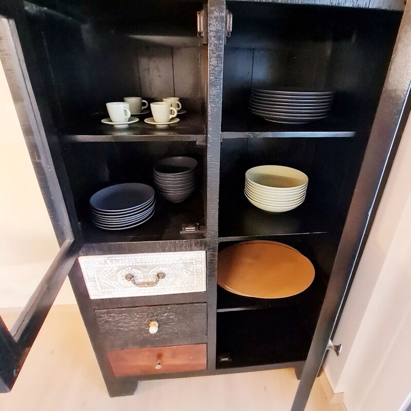 Dining Area with dishes and glasses