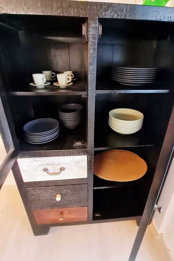 Dining Area with dishes and glasses