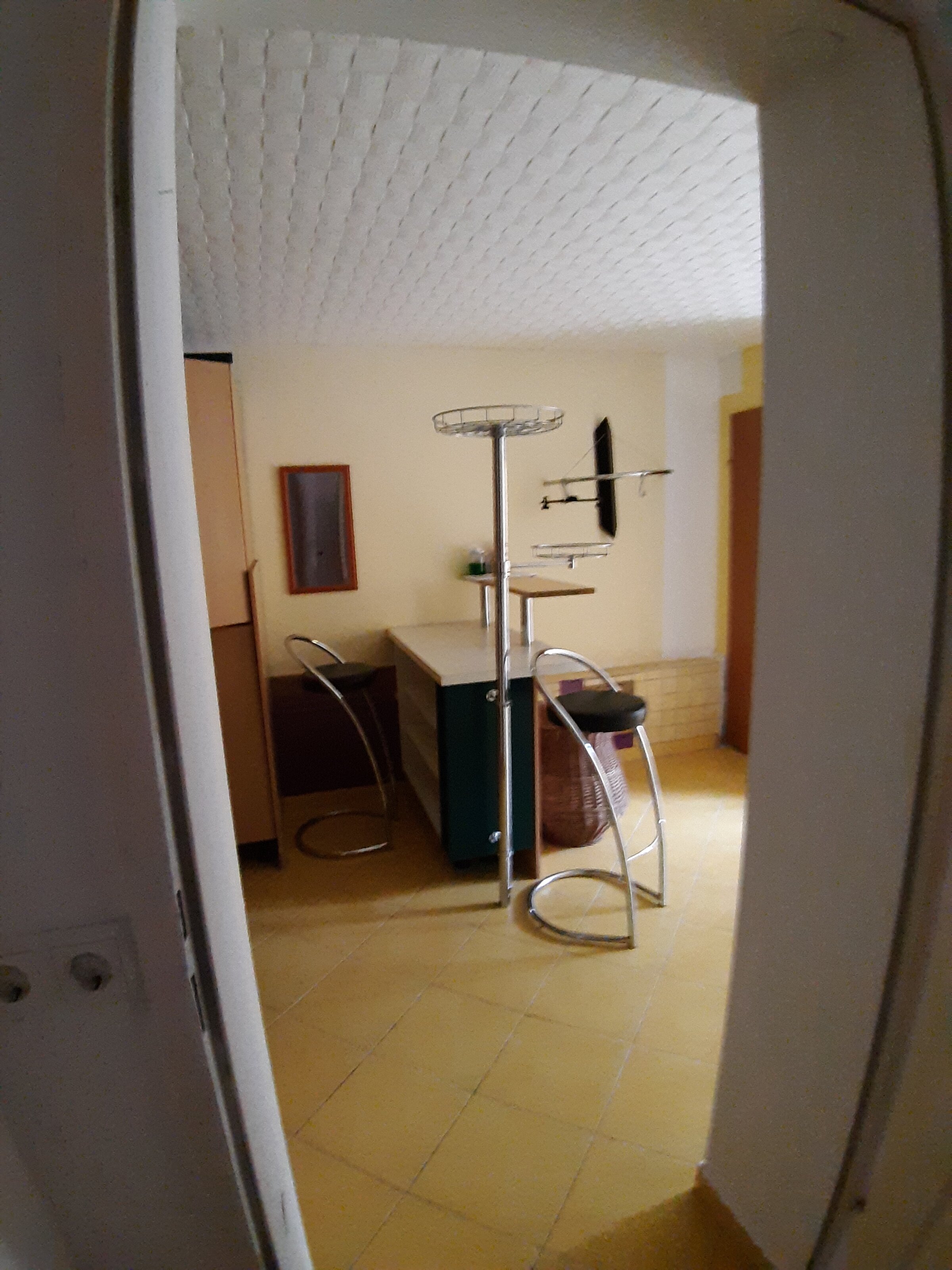 Between kitchen and living room