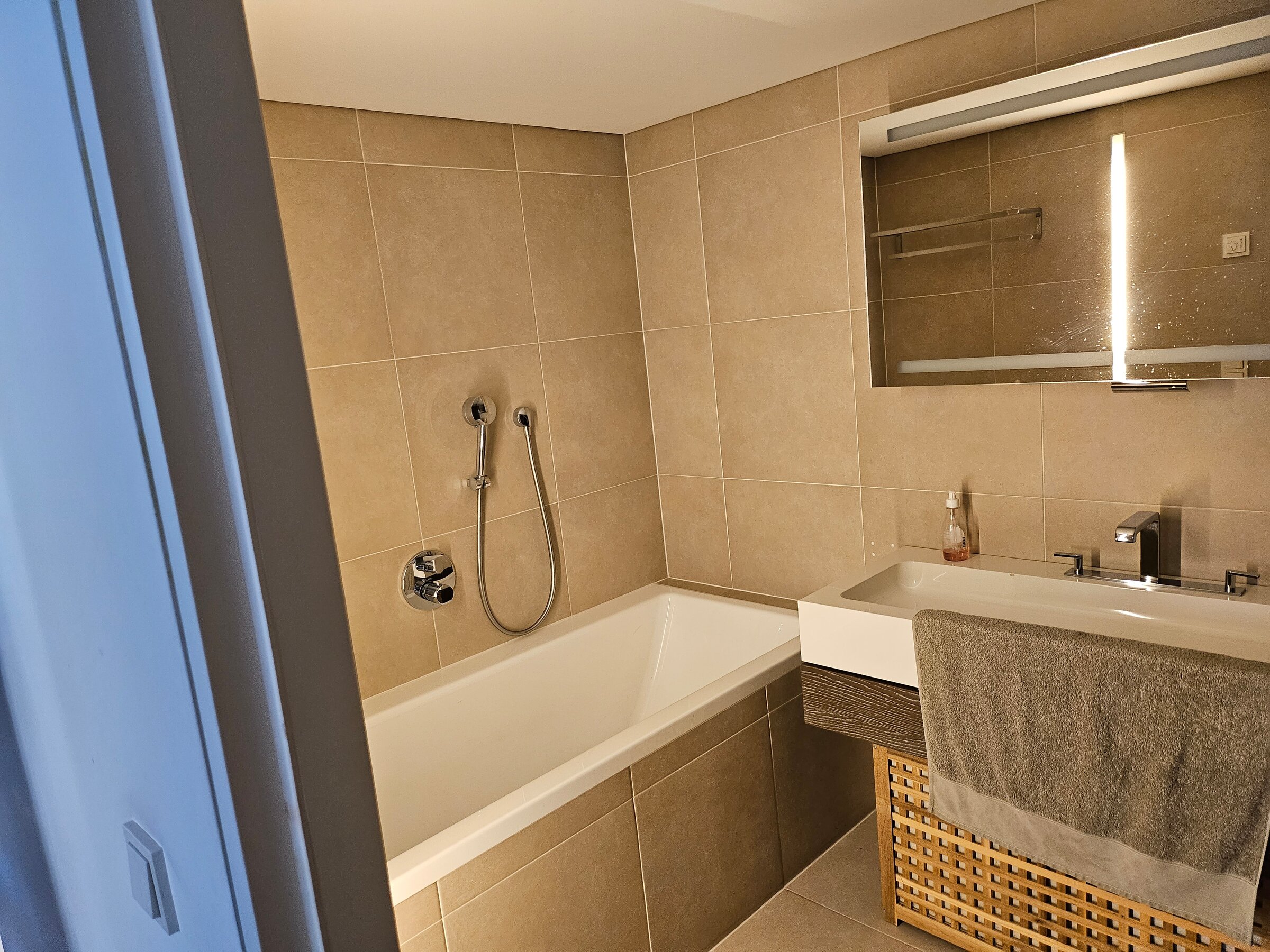 Bathroom with tub and shower