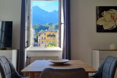 Bright dining area with mountain panorama: 2-room apartment for short-term rental & temporary housing for 1 to 6 months in Innsbruck