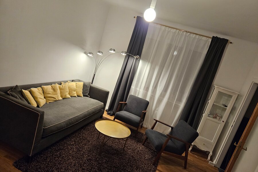 Stilvolles Wohnzimmer mit Designmöbeln – 2-Zimmer Wohnung zur Kurzzeitmiete & Wohnen auf Zeit für 1 bis 6 Monate in Wien