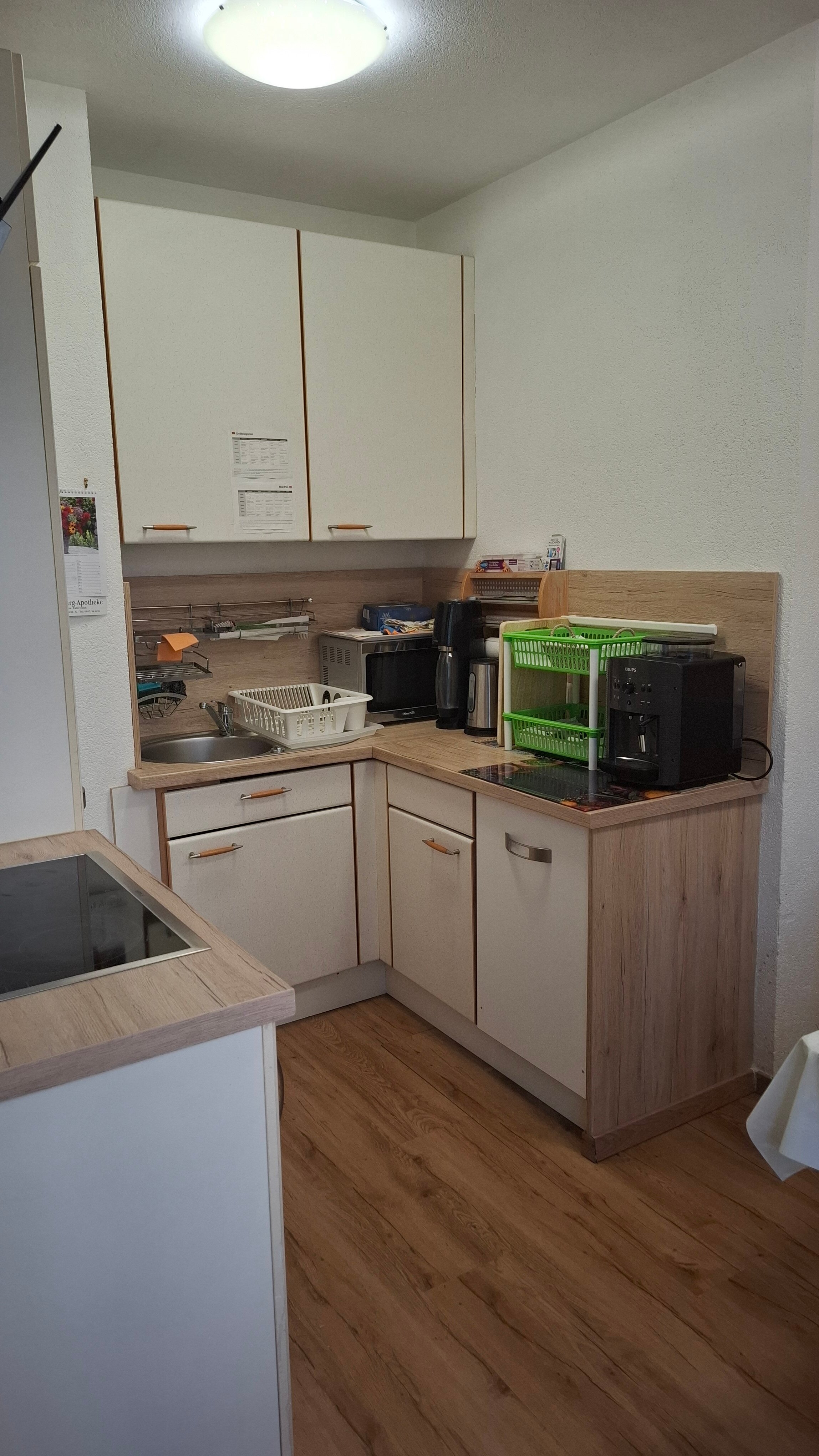 Kitchen with all possible amenities, dishwasher, microwave, oven, toaster, glasses...