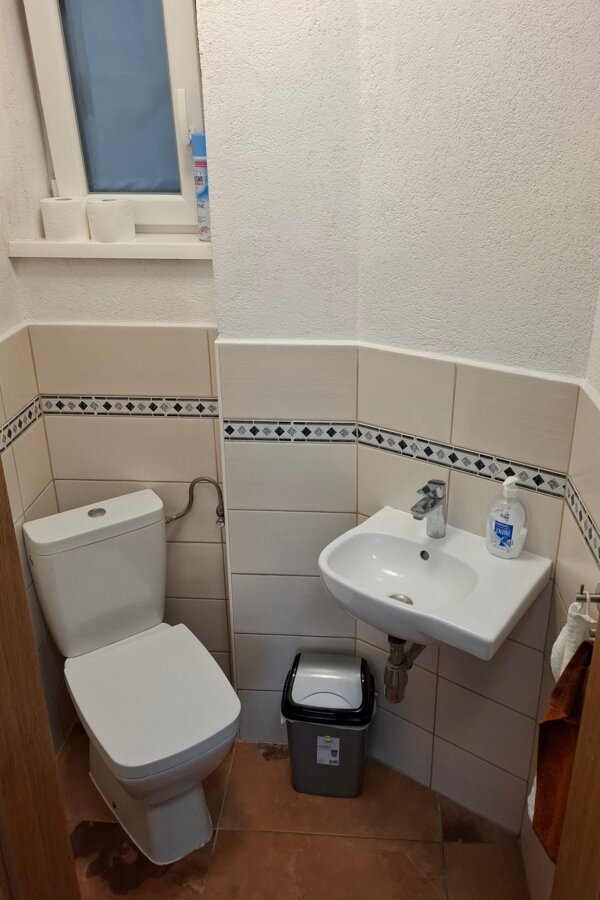 separate toilet with washbasin