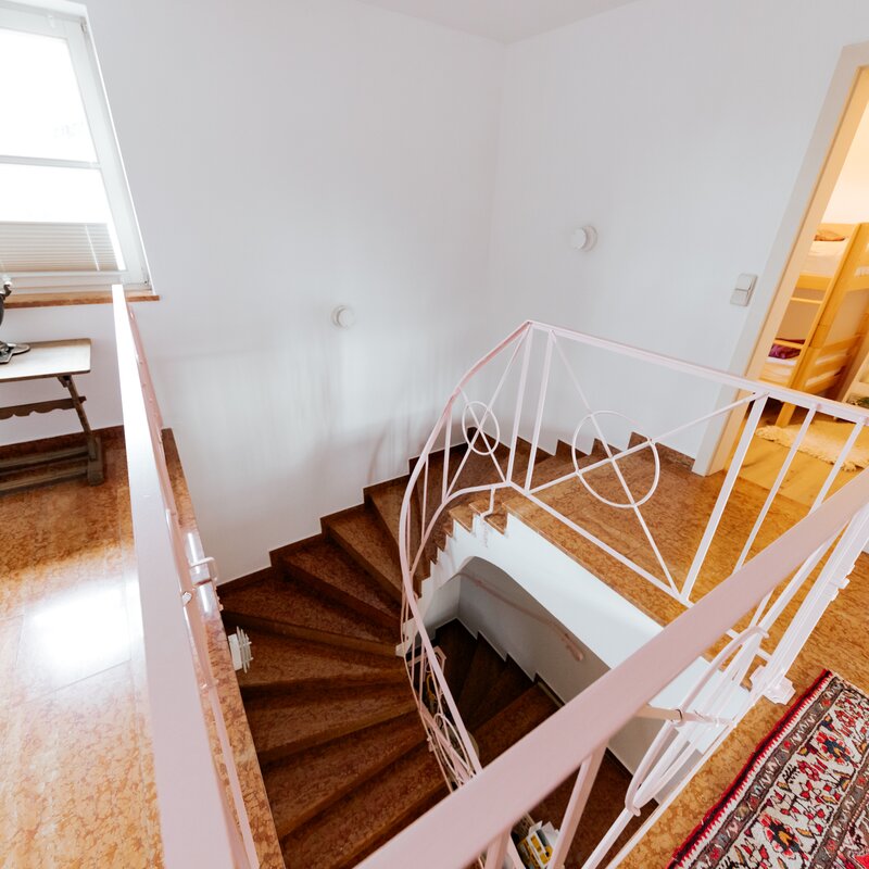 Stairway from ground floor to first floor with marble floor