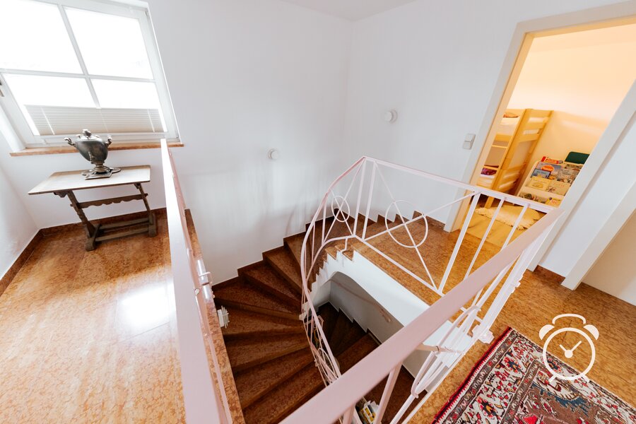Stairway from ground floor to first floor with marble floor