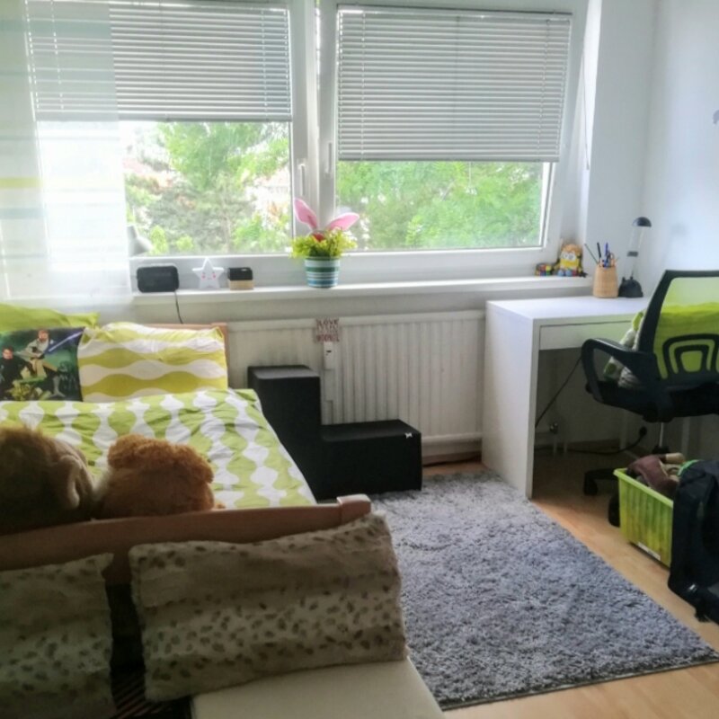 Schlafzimmer mit ausziehbarem Bett