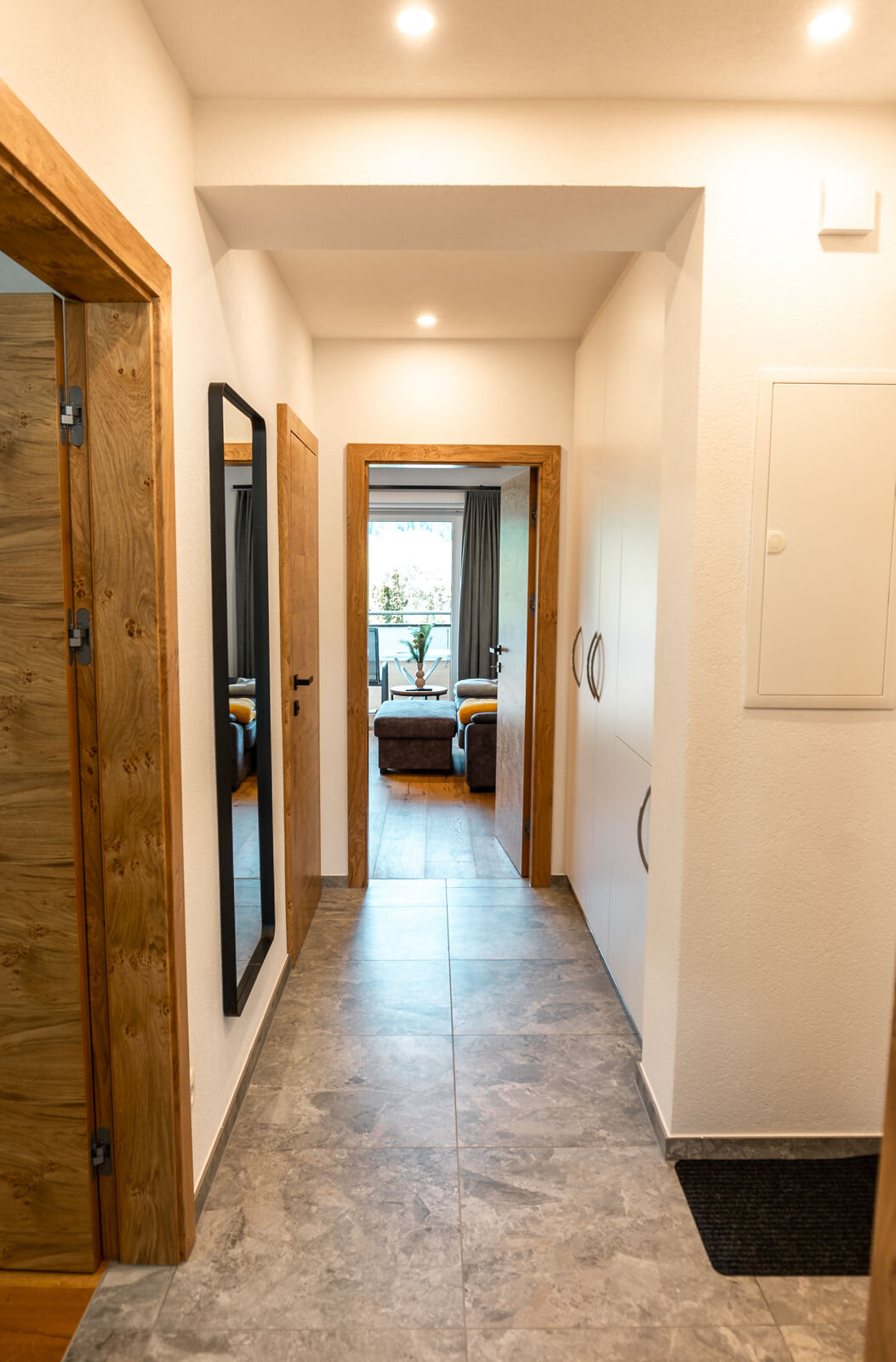 Entrance corridor with cloakroom and spacious storage cupboard 