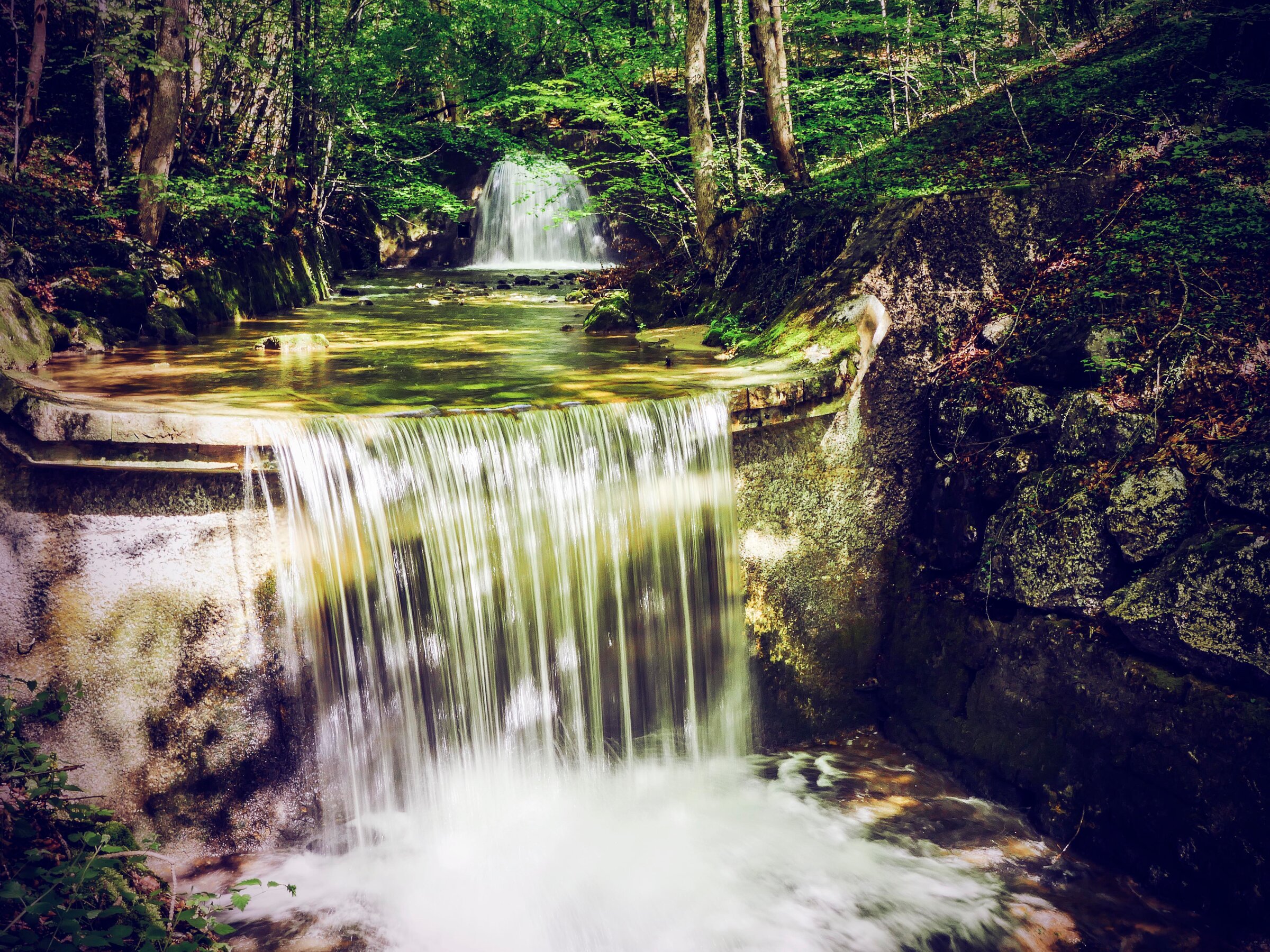waterfall behind the house