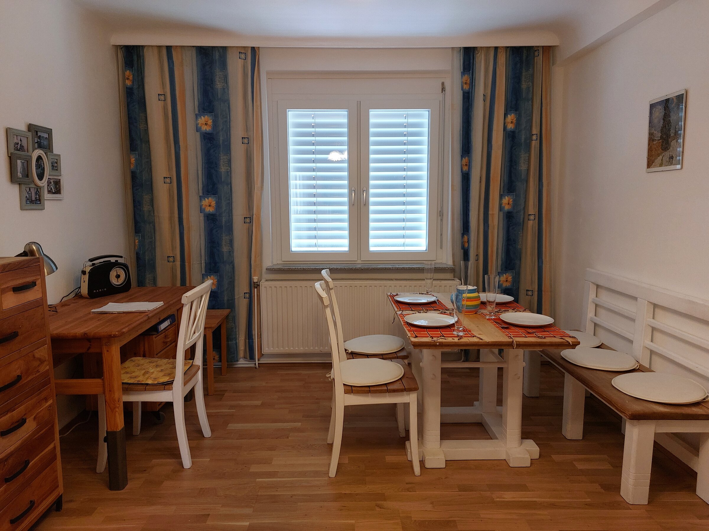 Living room with dining table and desk