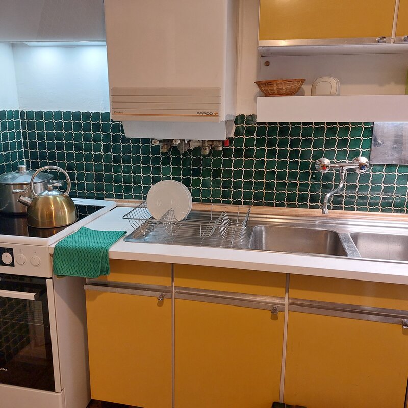Kitchen - cooking area and large sink