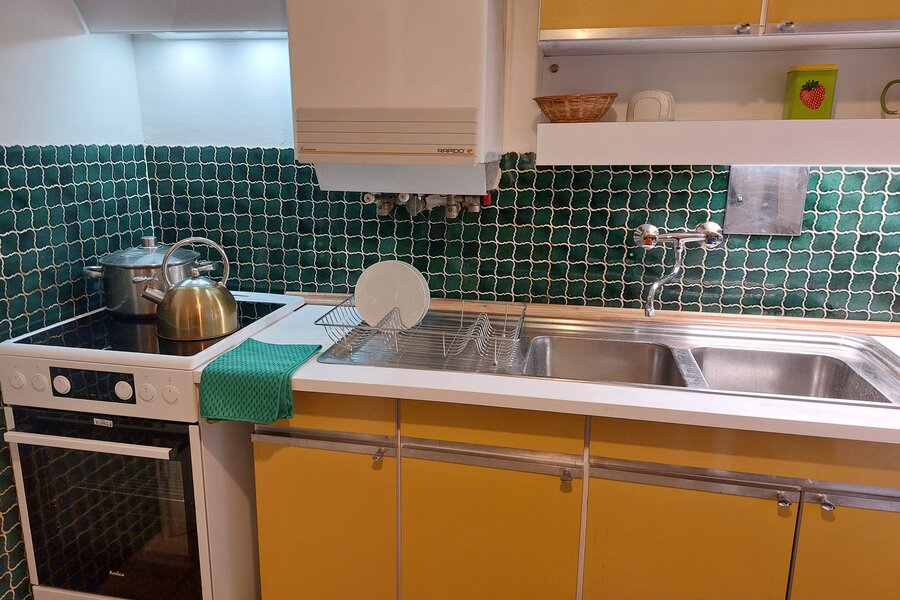 Kitchen - cooking area and large sink