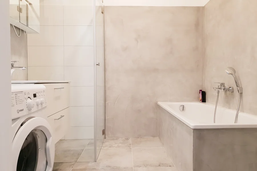 Bath with shower and bathtop