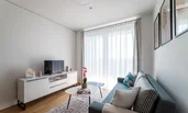 Wohnzimmer mit ausziehbarer Couch