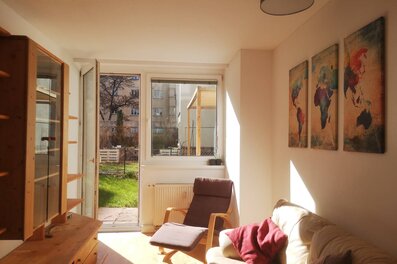 Bright living room with garden access – 3-room apartment, short-term rental & temporary housing for 1 to 6 months in Vienna