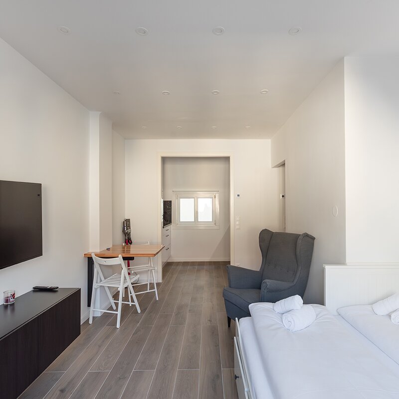 Helles, modernes 1-Zimmer Apartment mit TV & Arbeitsplatz – Kurzzeitmiete & Wohnen auf Zeit in Wien, 1 bis 6 Monate.