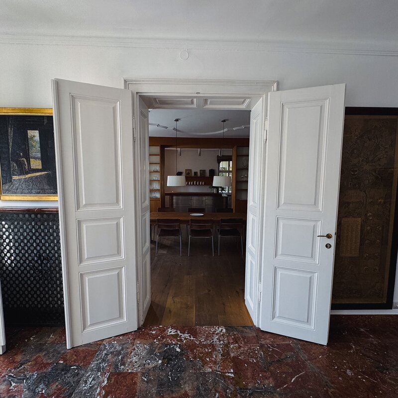 View through the dining room into the kitchen