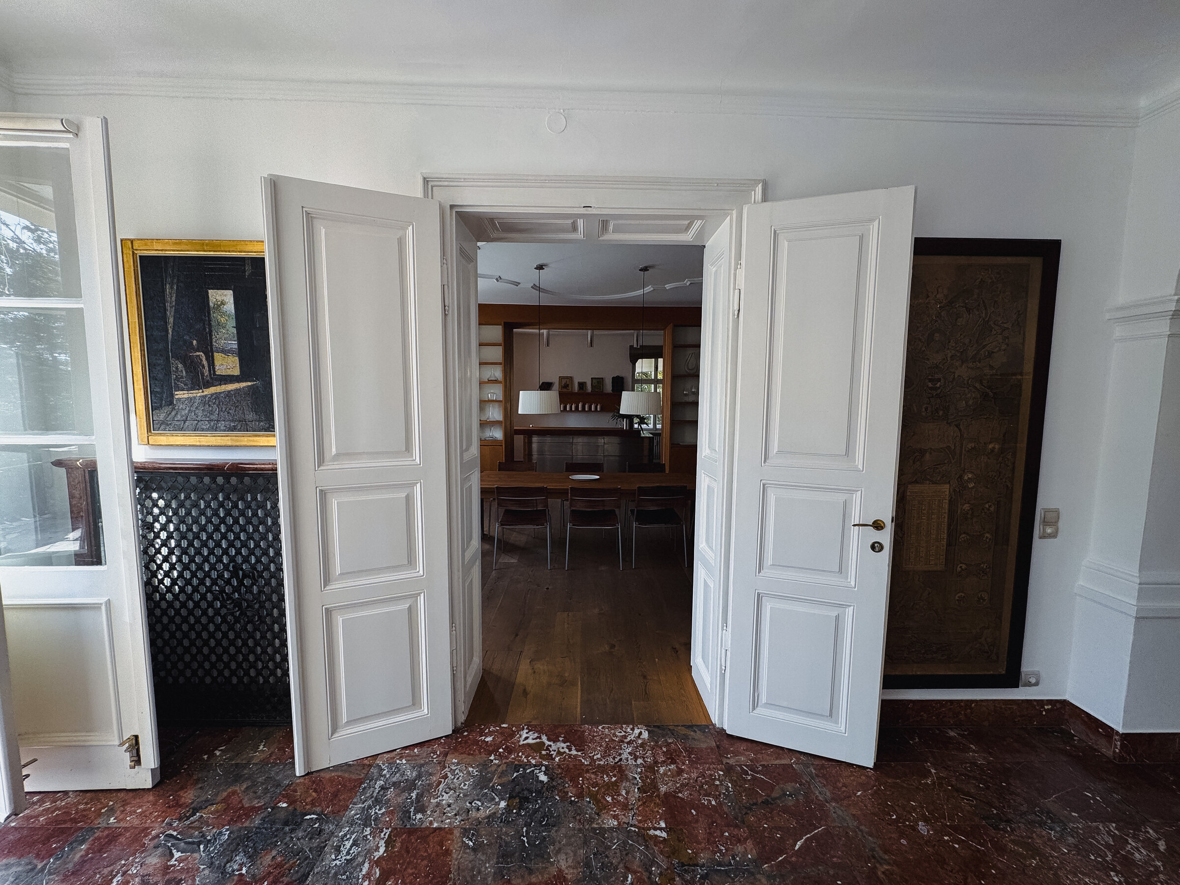 View through the dining room into the kitchen