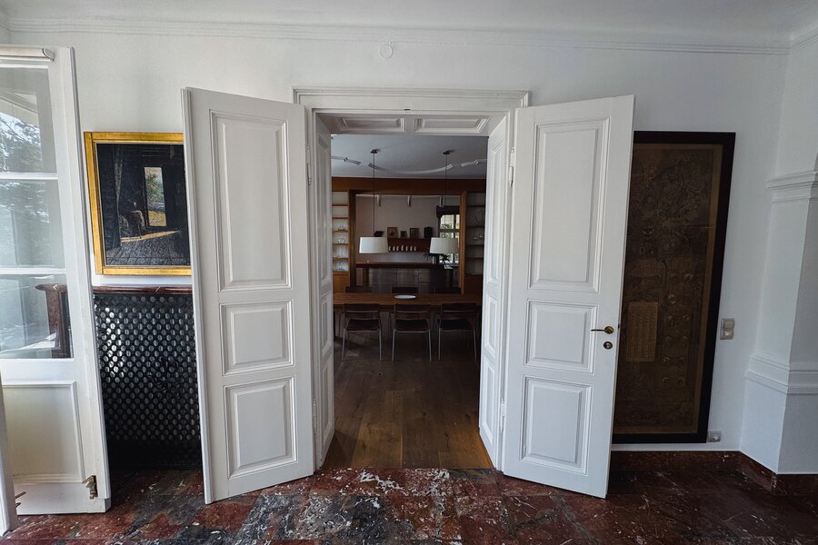 View through the dining room into the kitchen